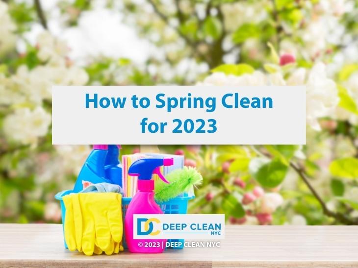 Title of this article, accompanied by a box of cleaning supplies, with a background of trees of green, white, and pink.