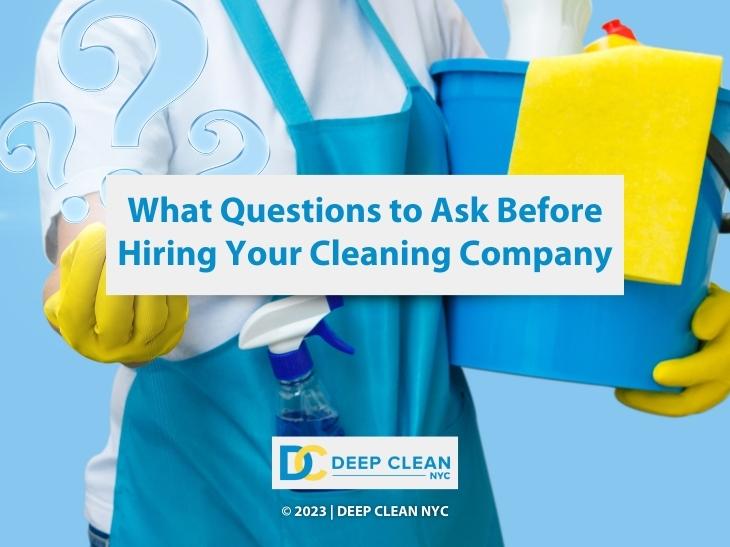 Featured: Cleaning person holding bucket of cleaning supplies answering questions- What Questions to Ask Before Hiring Your Cleaning Company